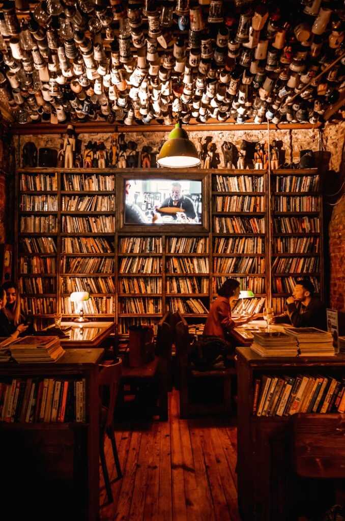 Interior of cozy cafe with bookshelves